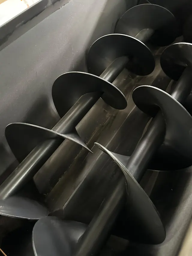 Twin stretching augers