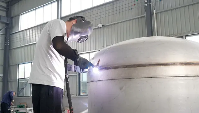 TIG welding a tank head